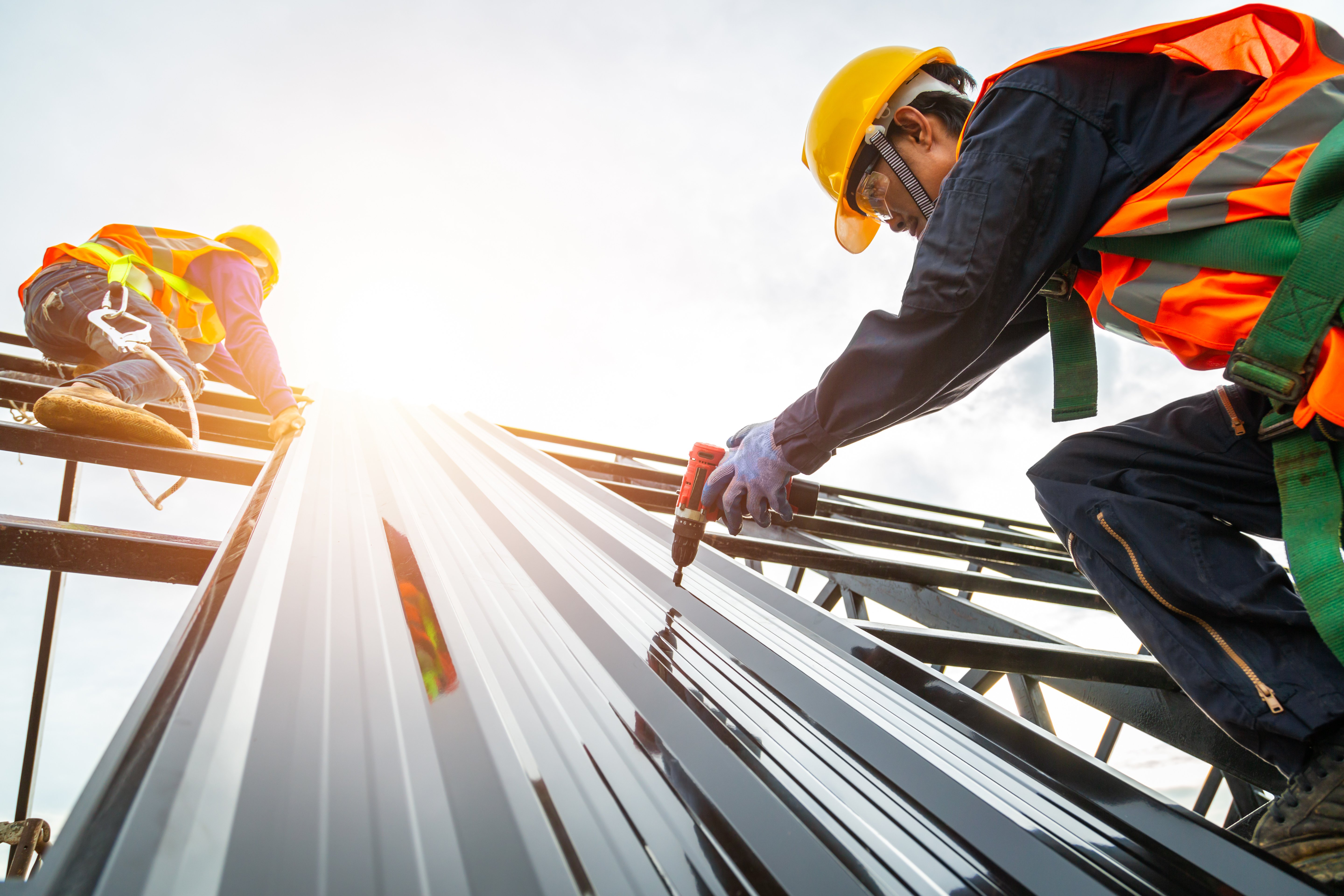 Construction Worker Installing Roof